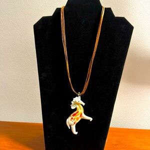 40 Glass Horses , Piece is Unique. W/ Brown Multi Cord adjustable Necklace